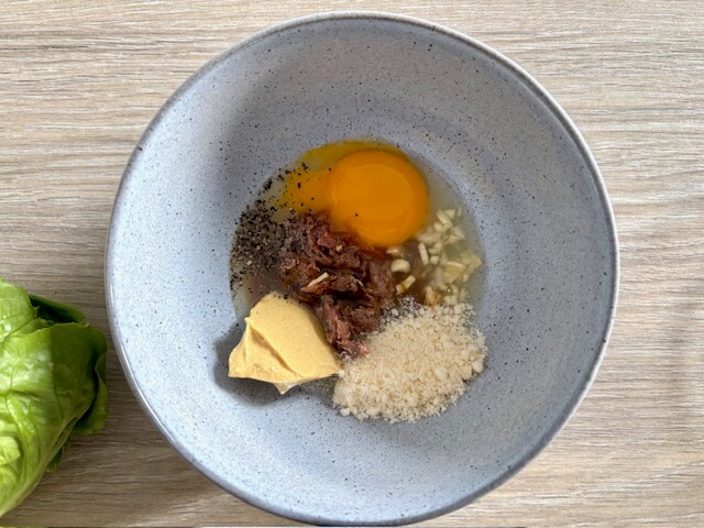 Bowl containing dressing ingredients