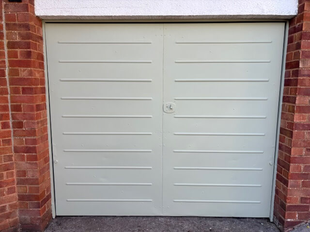 After shot - freshly painted garage door painted in Wise Old Sage