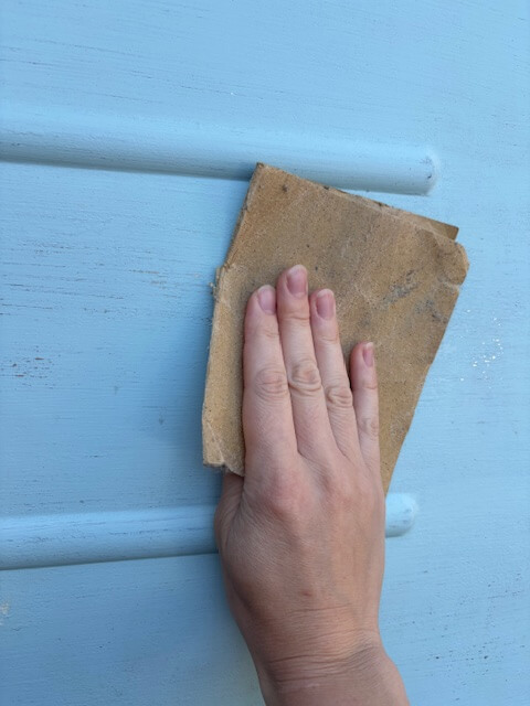 Sanding the garage door